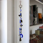 Witch's Bell: Glass Evil Eyes, Pentacle, Charms, Beads - Handcrafted