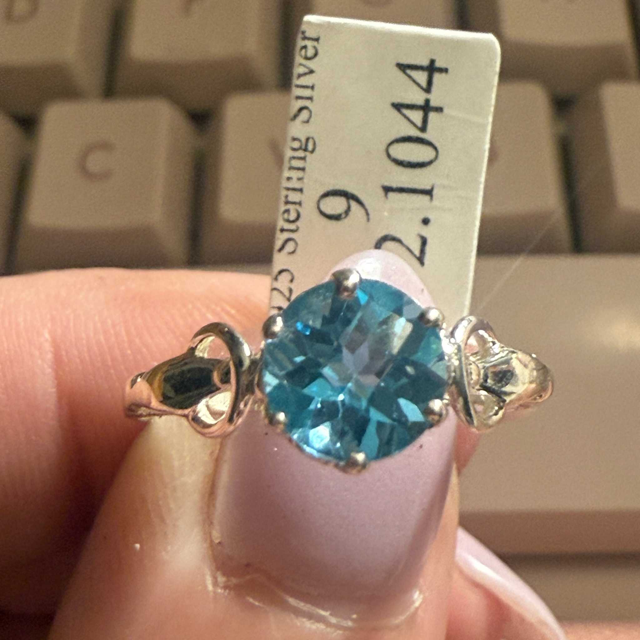 Sterling Silver Round Blue Topaz Ring with Scrollwork Detailing (Size 9)