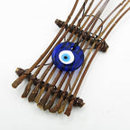 Large Glass Evil Eye with Long Twigs Wall Hanging - Handcrafted